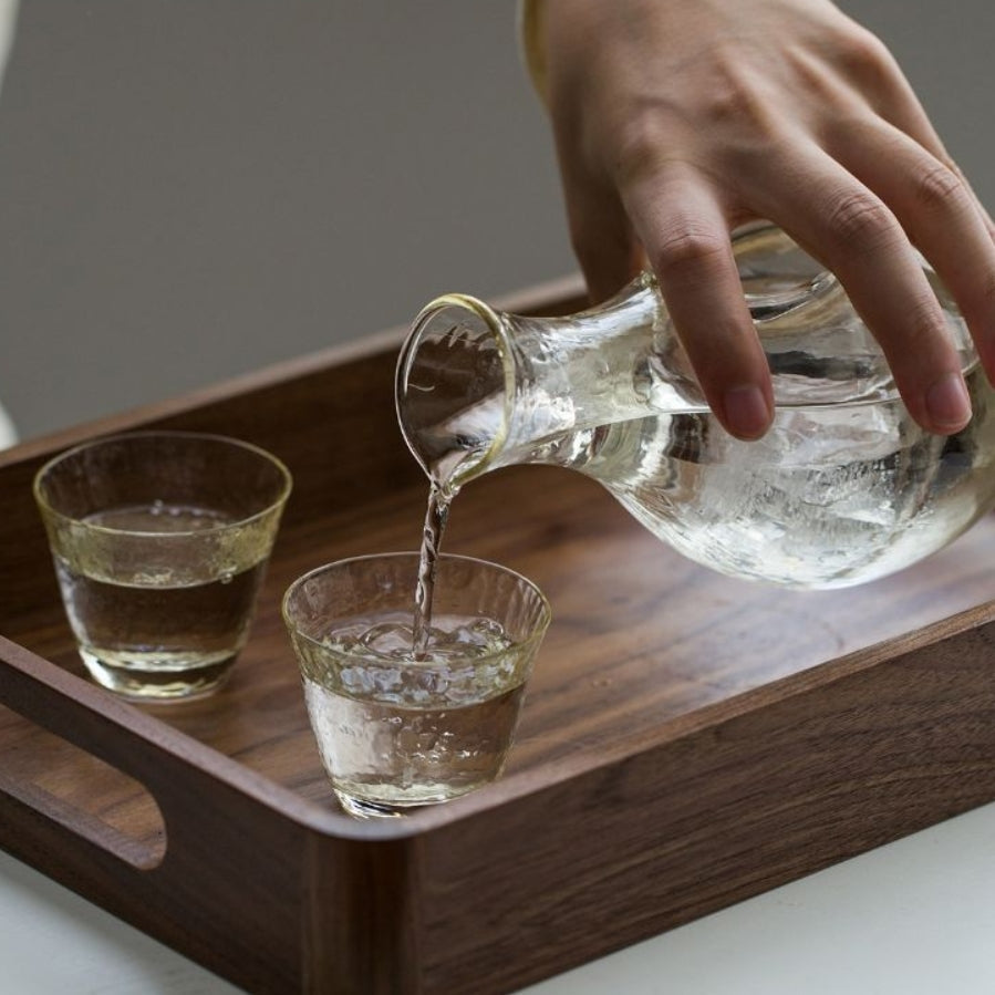 Why is sake served in small glasses?